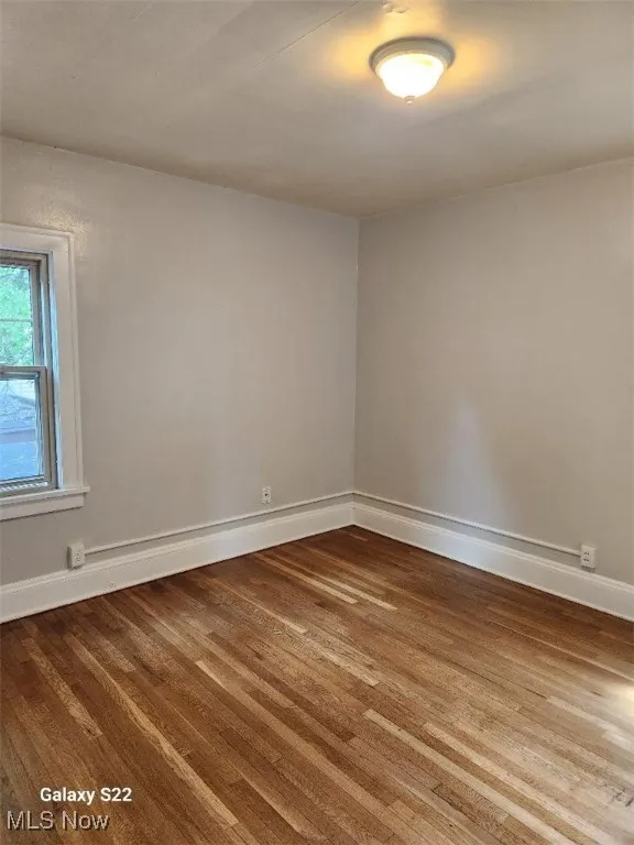 Empty room with wood finished floors