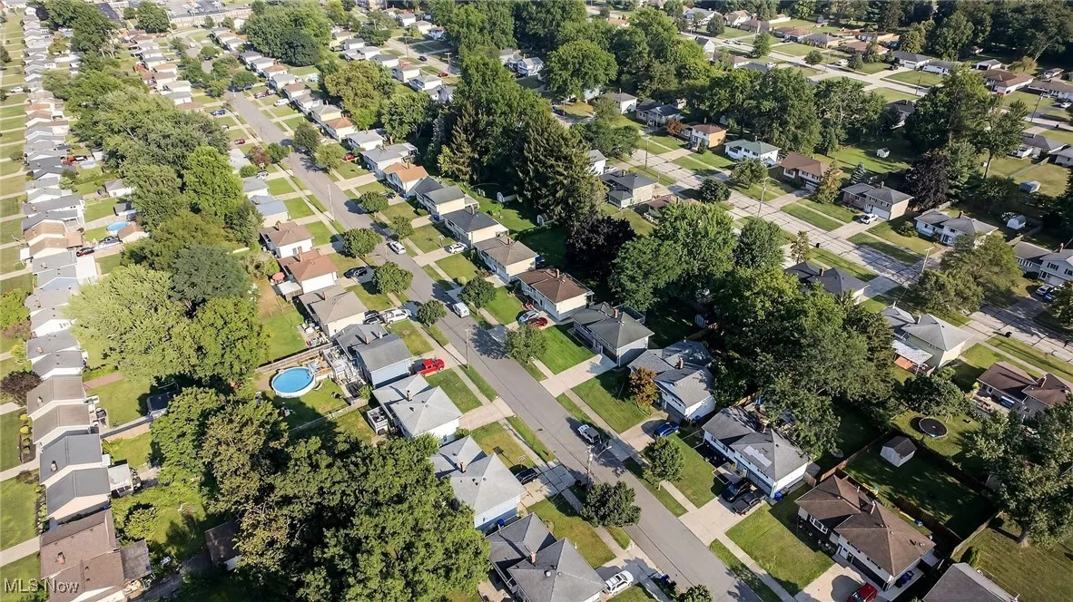 View of property location with nearby suburban area