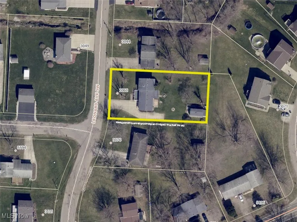 Aerial overview of property's location featuring property parcel outlined