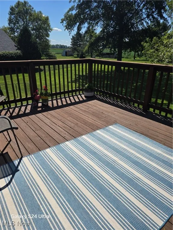 Wooden deck with a lawn