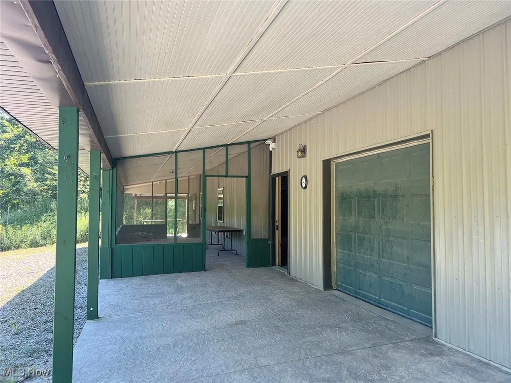 View of patio with an attached carport
