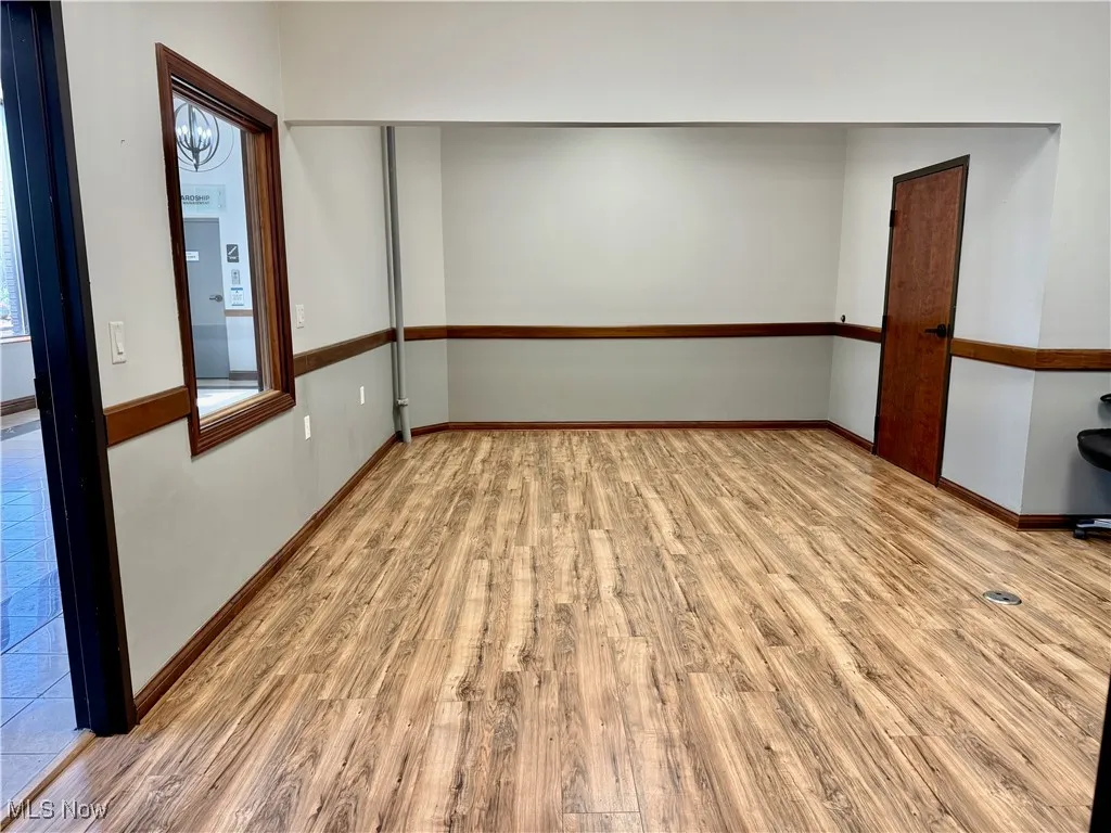 Here you go! Office #A measures 23'x14', and runs into the larger office space (or conference room) and the private office that faces west, looking out towards the parking area. Bathroom is to the right, Suite #B and Suite #C are behind.