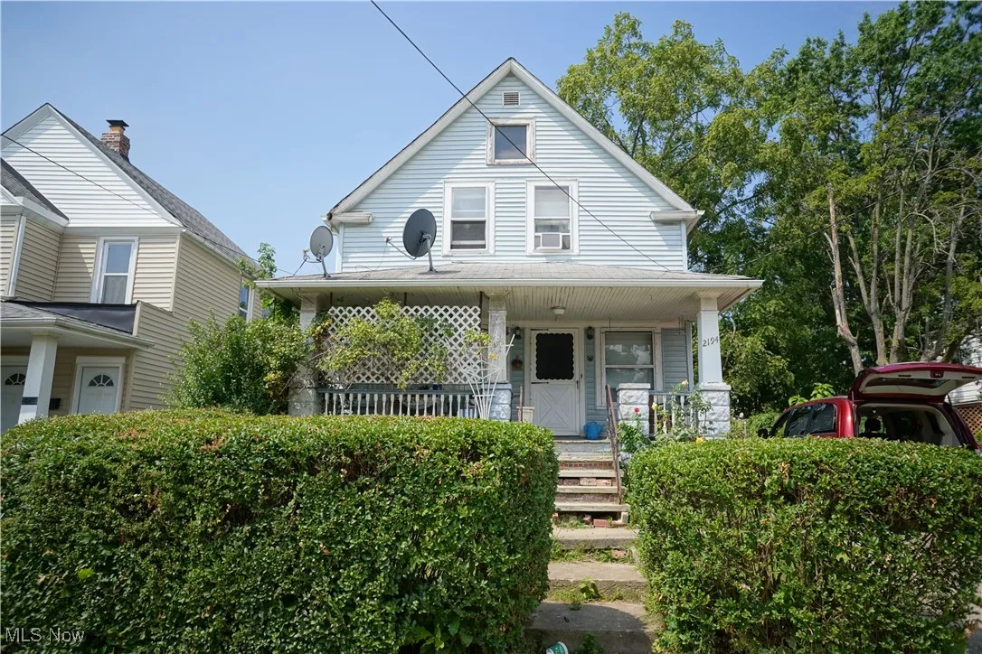 View of front of property with a porch