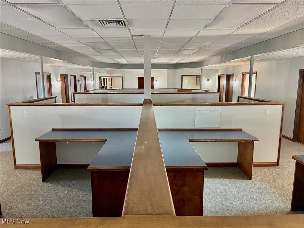 6 Cubicles in all! Measuring approx. 11'x8'. Plenty of space in each, with wall outlets as well.