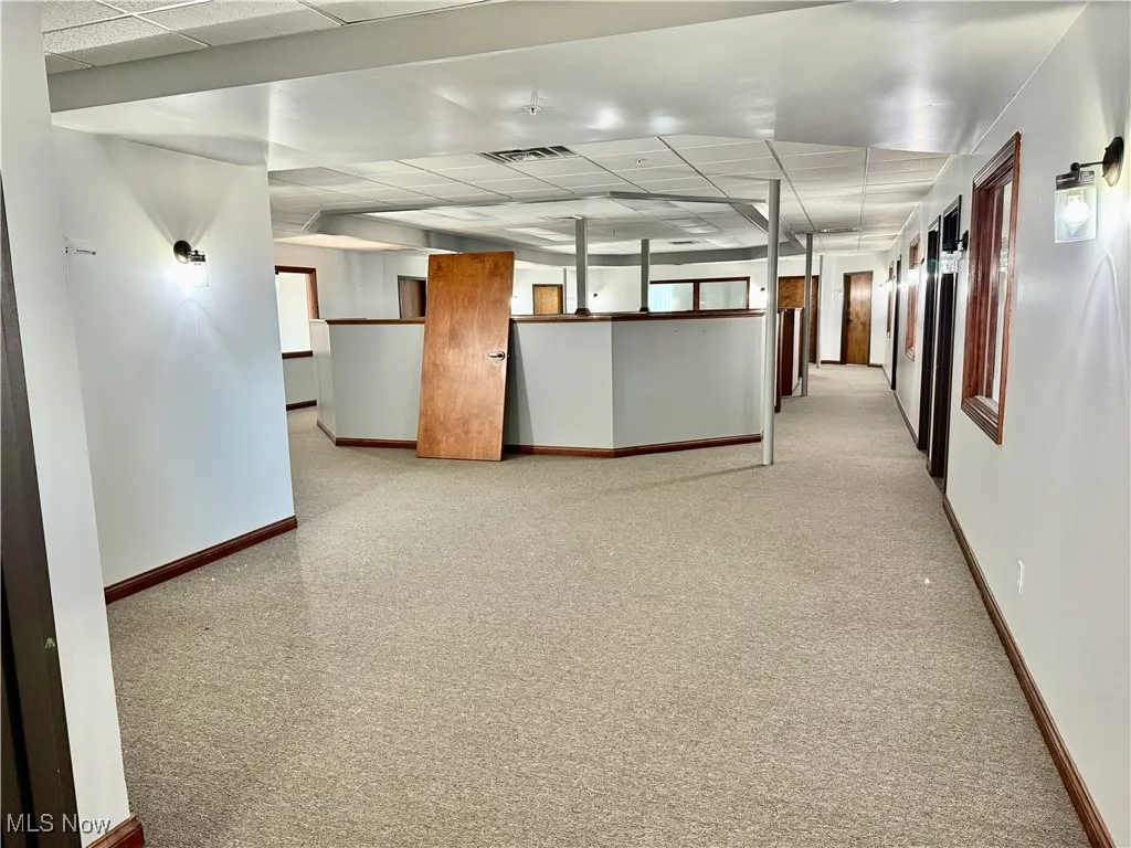 Welcome to the bull pen! The main office area reaches the 6 cubicles and 8 of the 9 main offices on the second floor. Break room the right.