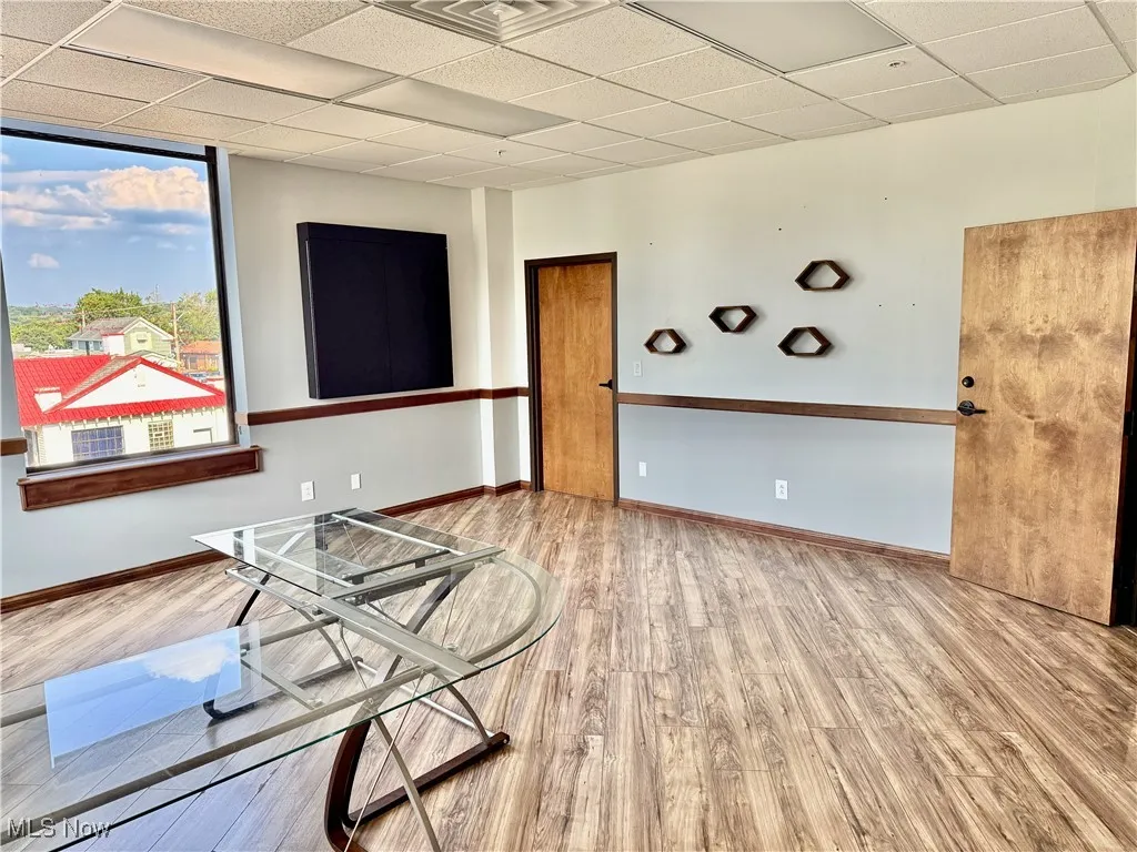 Welcome Executives, to the main office suite! Facing downtown Massillon, this is easily one of, if not the, most spacious suites in the city, with the best view! Measuring 17'x18', and with access to your junior assistant or finance department next door. Also, accessability to the Executive Conference Room!