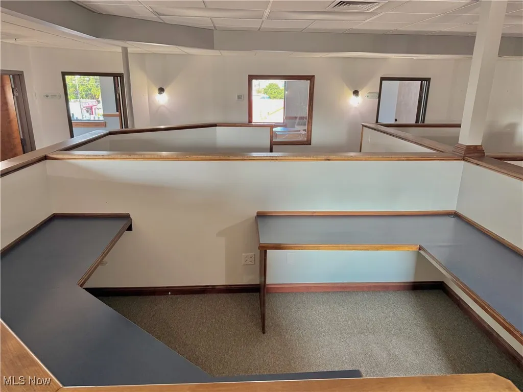 6 Cubicles in all! Measuring approx. 11'x8'. Plenty of space in each, with wall outlets as well.