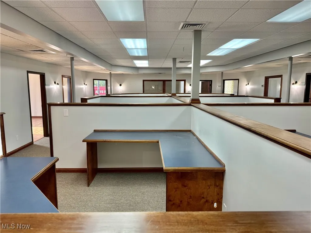6 Cubicles in all! Measuring approx. 11'x8'. Plenty of space in each, with wall outlets as well.