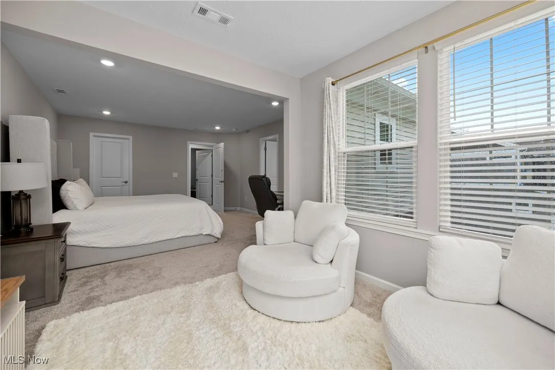 Bedroom featuring carpet floors and recessed lighting