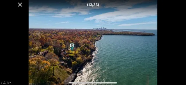 Water view featuring a forest