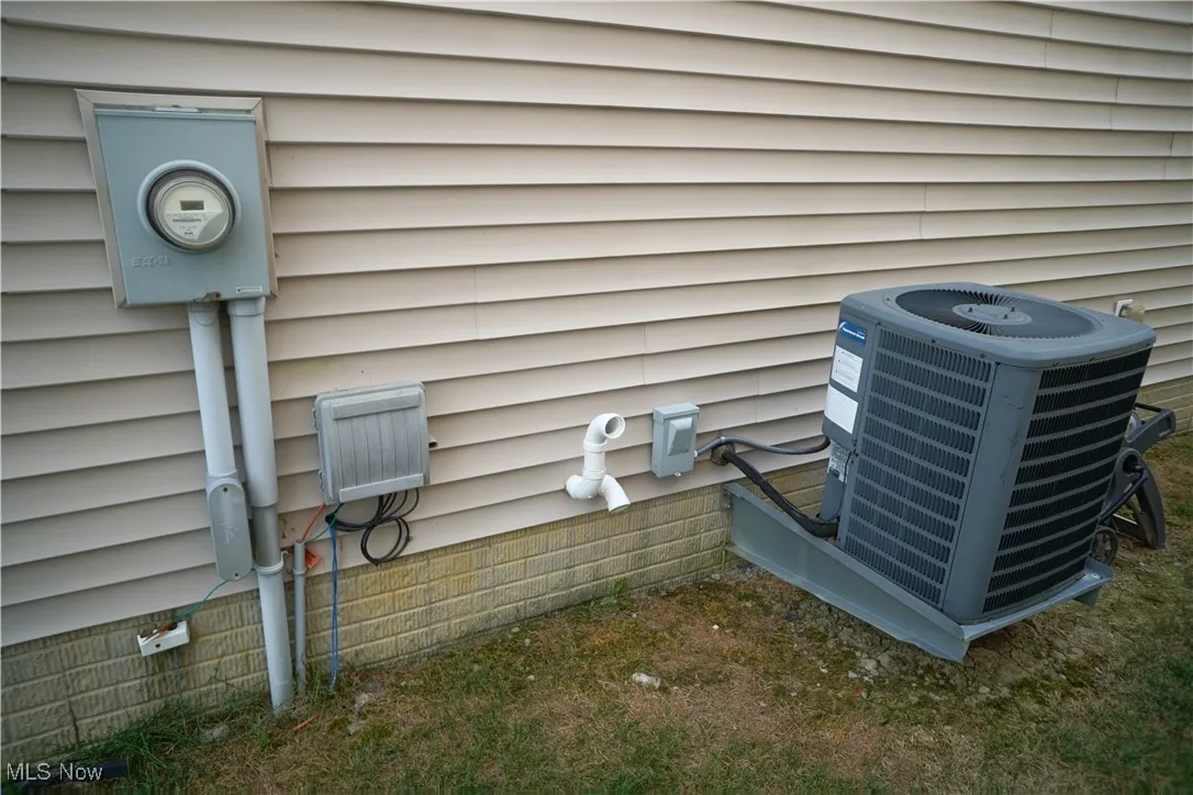 Exterior view of a cooling unit and electric meter