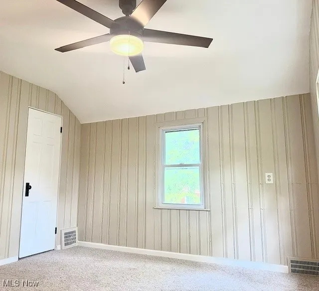 Shiplap Paneled 2nd Bedroom with Ceiling Fan