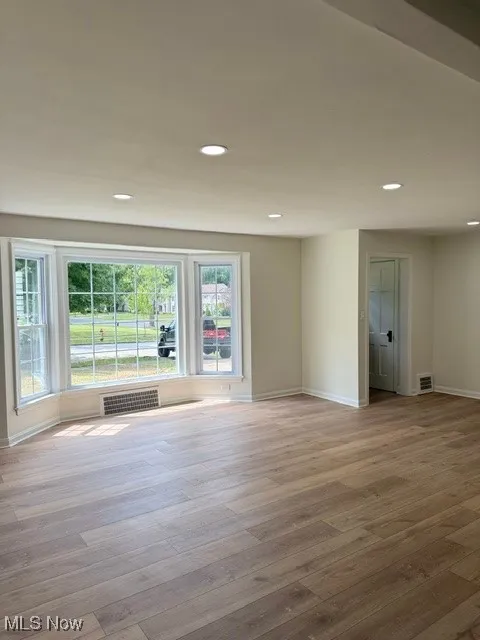 Wide Plank Light Luxury Vinyl Flooring throughout 1st Floor