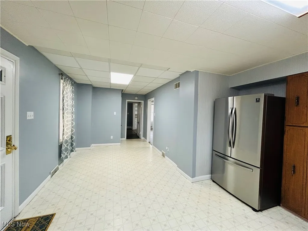 Eat-in kitchen with refrigerator