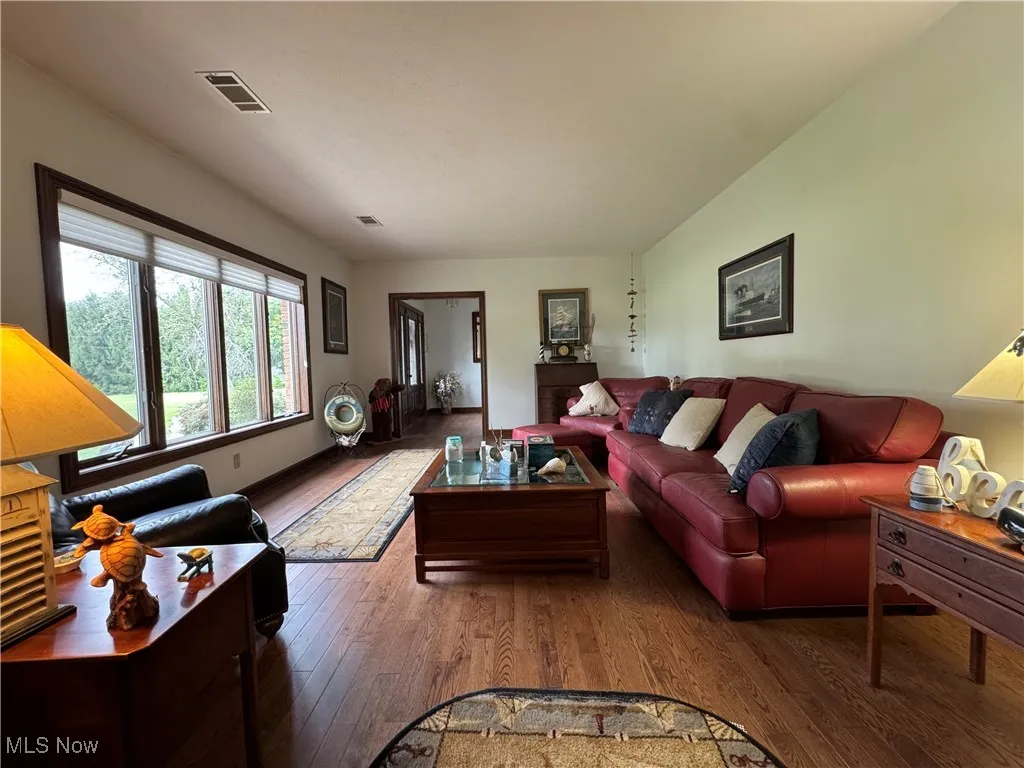 Living area with wood finished floors
