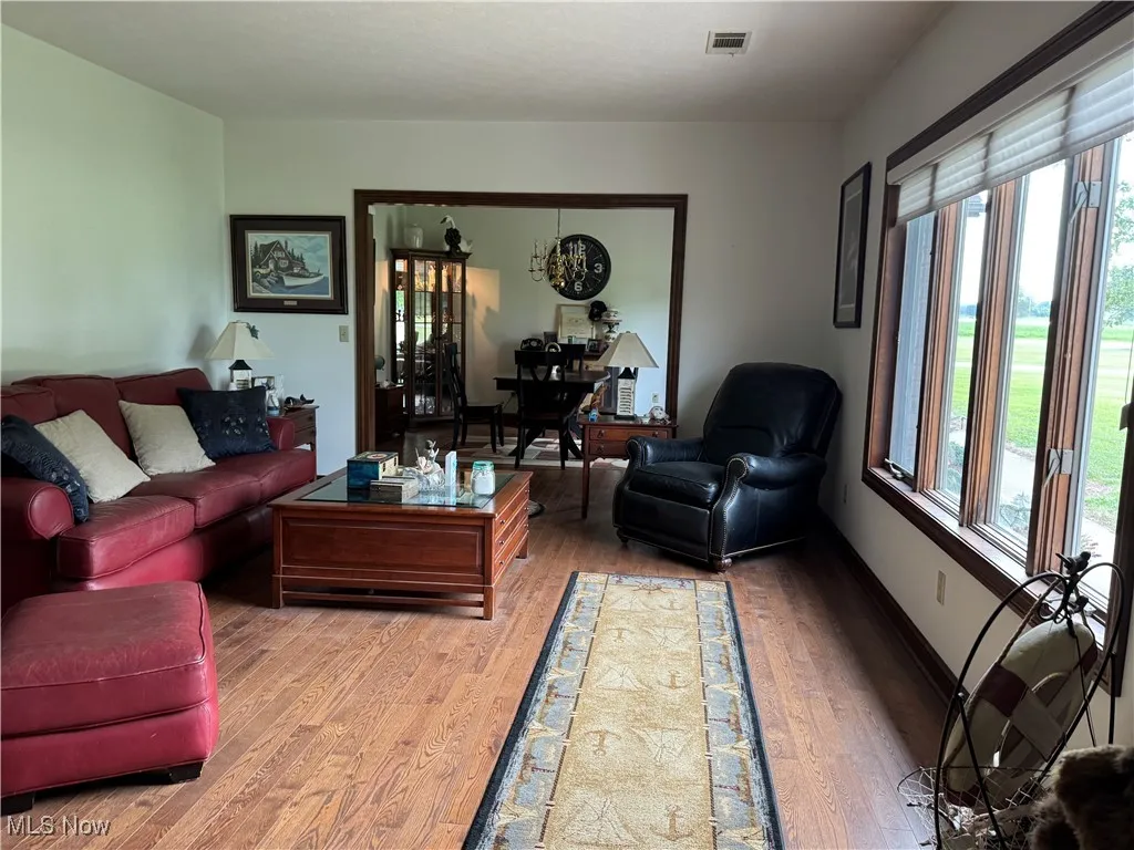 Living area with wood finished floors