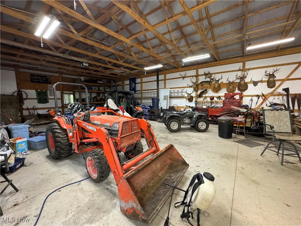 Garage featuring metal wall