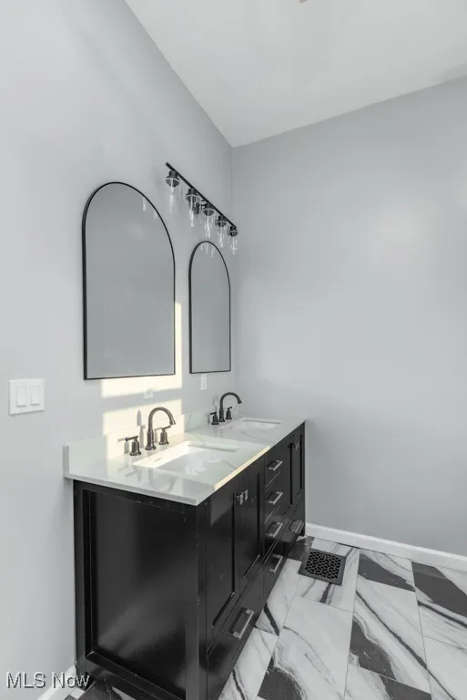 Master bath with gorgeous double vanity.