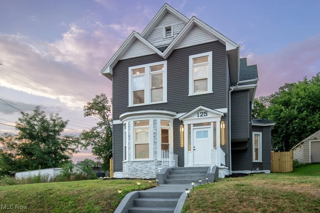 New vinyl siding and roof and cool light fixtures make for a very handsome house!!