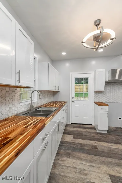Door leads to covered back patio and fenced-in backyard.