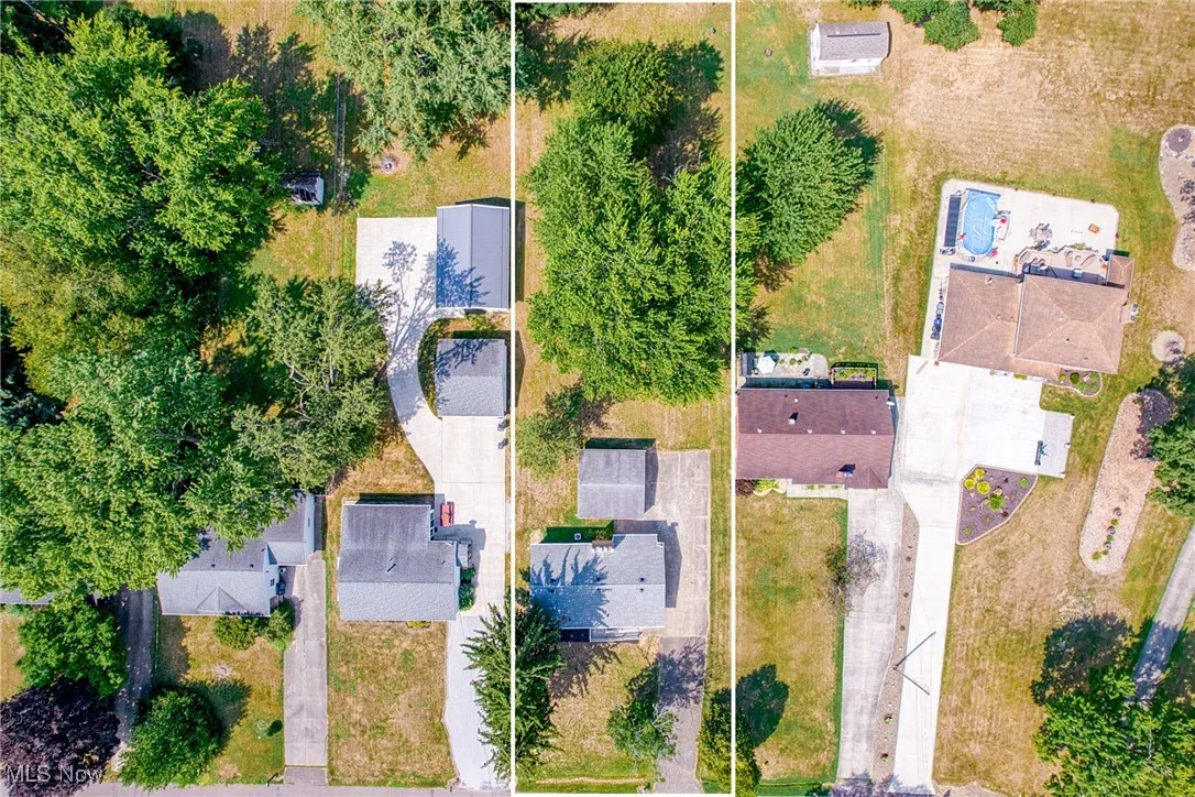 Aerial perspective of suburban area featuring property boundaries highlighted