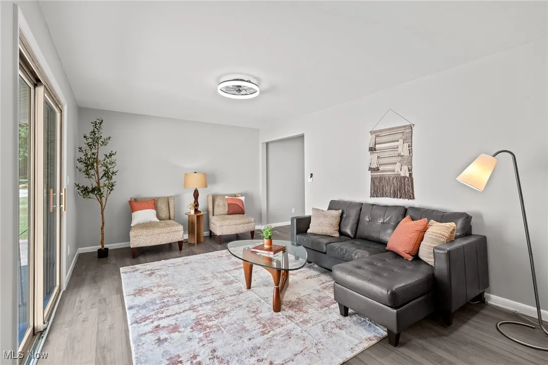 Living room featuring light wood-style flooring