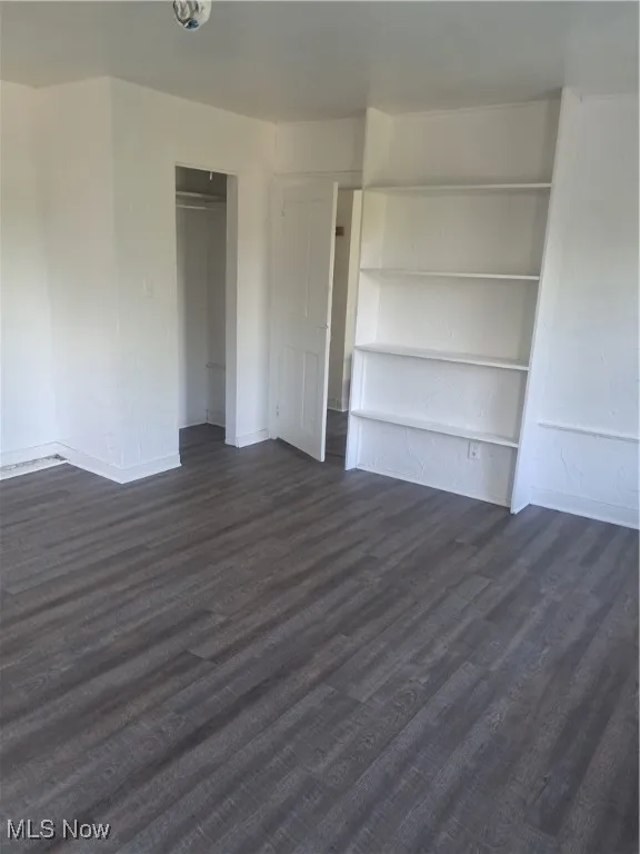 LR with built-in bookcase and LVT flooring
