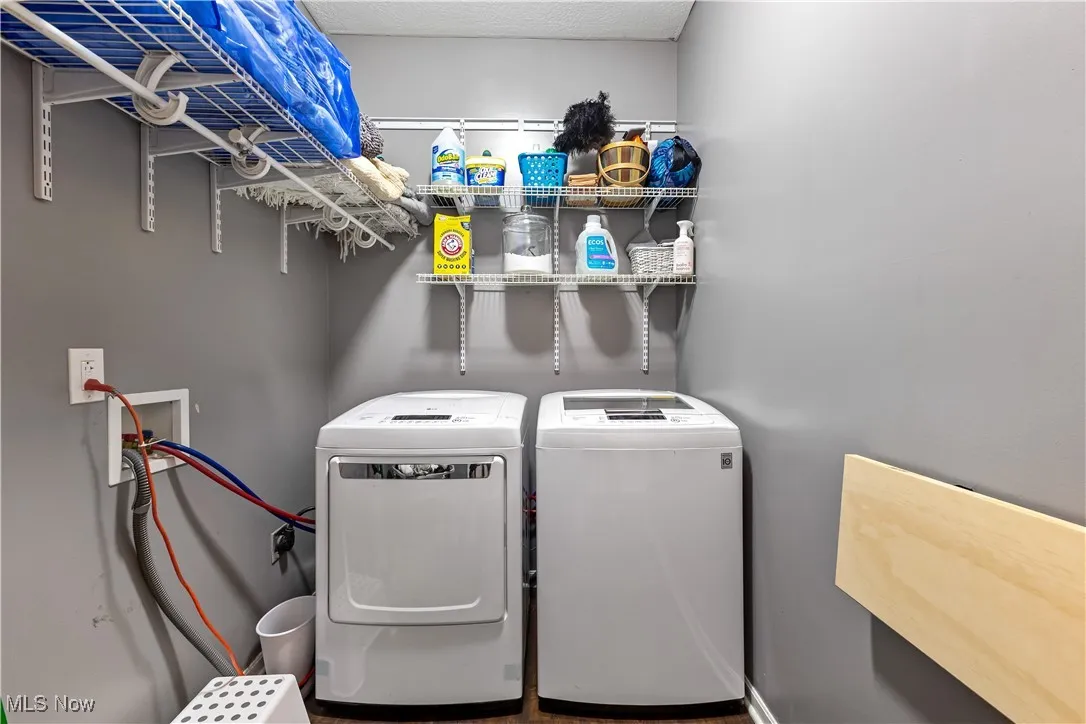 Laundry room with washing machine and dryer
