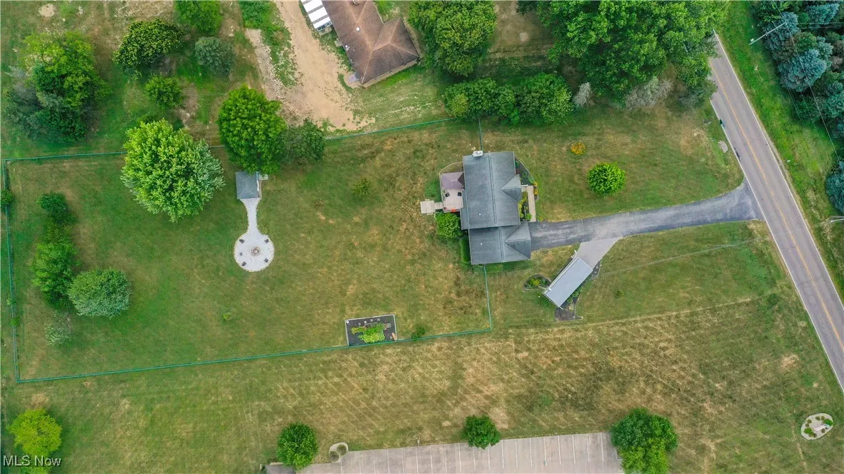 Aerial overview of property's location featuring property parcel outlined