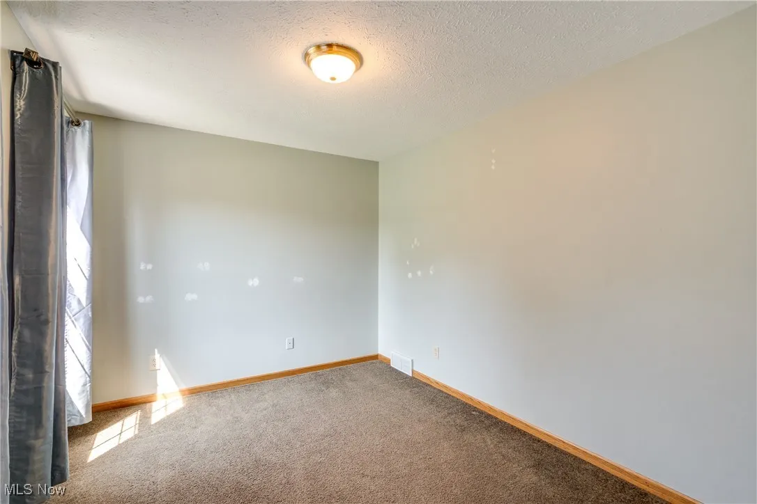 Could be office, play room, etc. Front of home across from dining room.