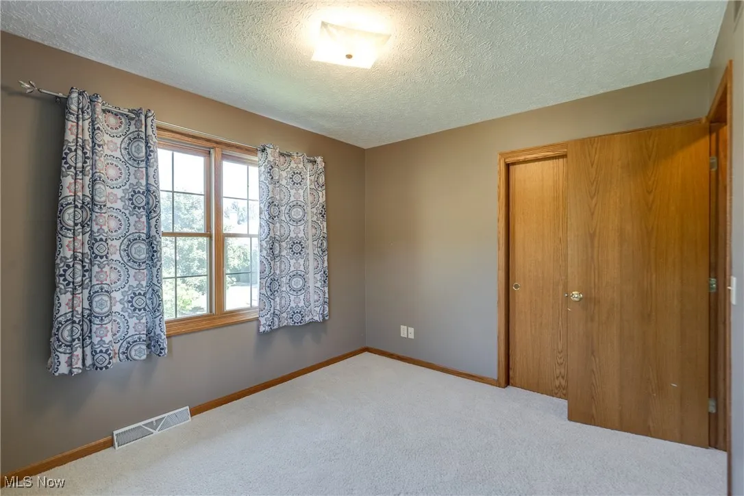 Main Suite with full private bath and walk-in closet