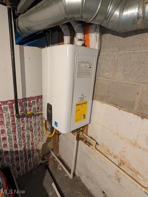 Utilities featuring tankless water heater