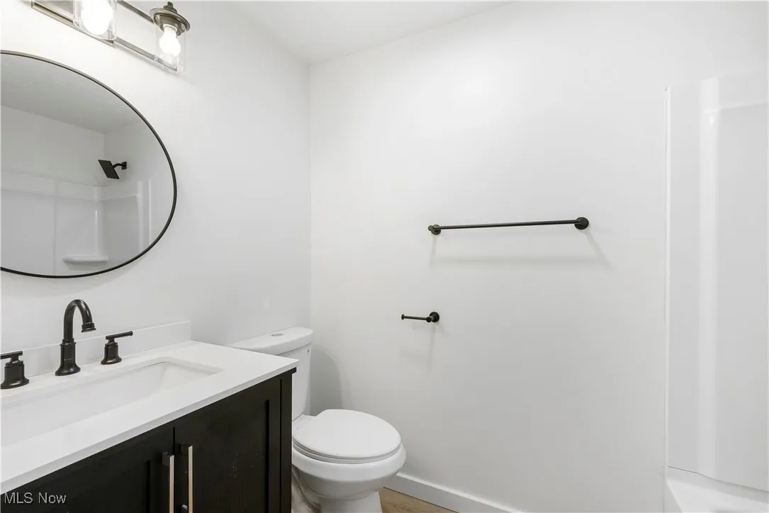 Bathroom with vanity and toilet