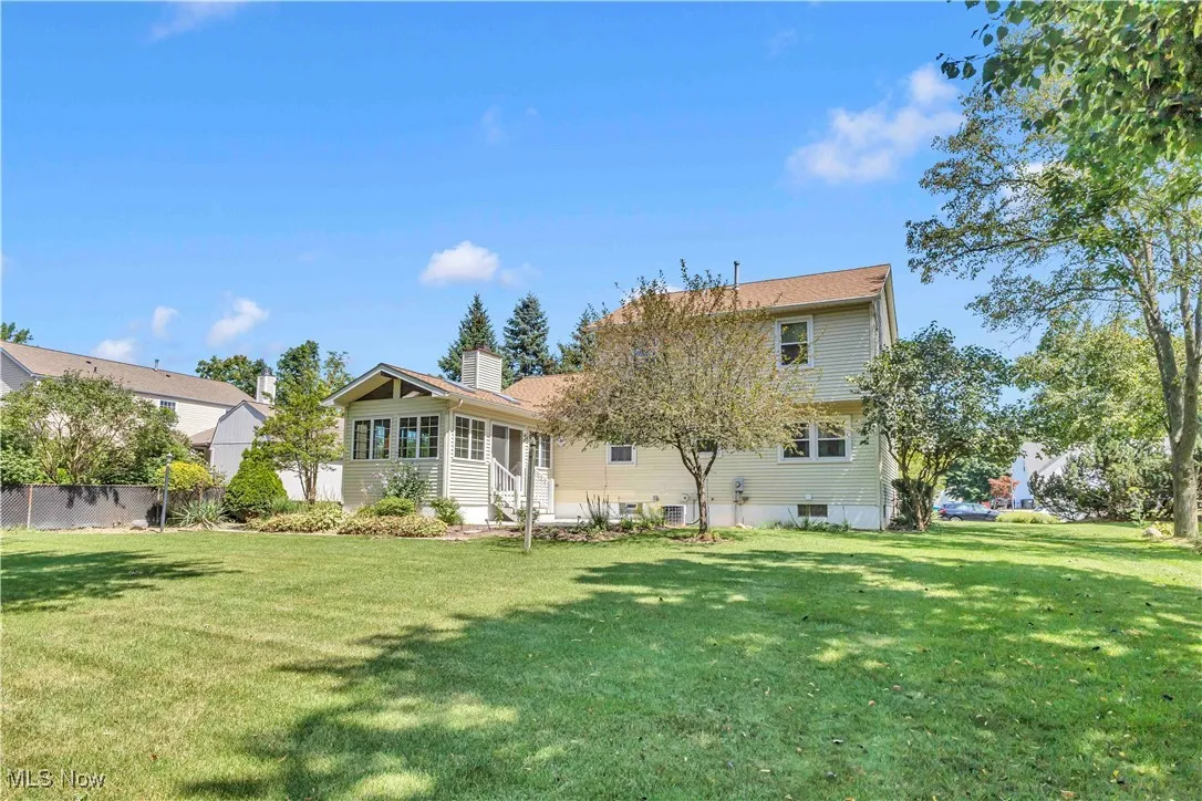 View of the backyard and back of the home.