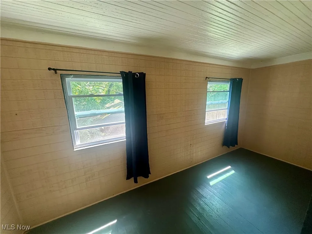 Empty room with wood finished floors