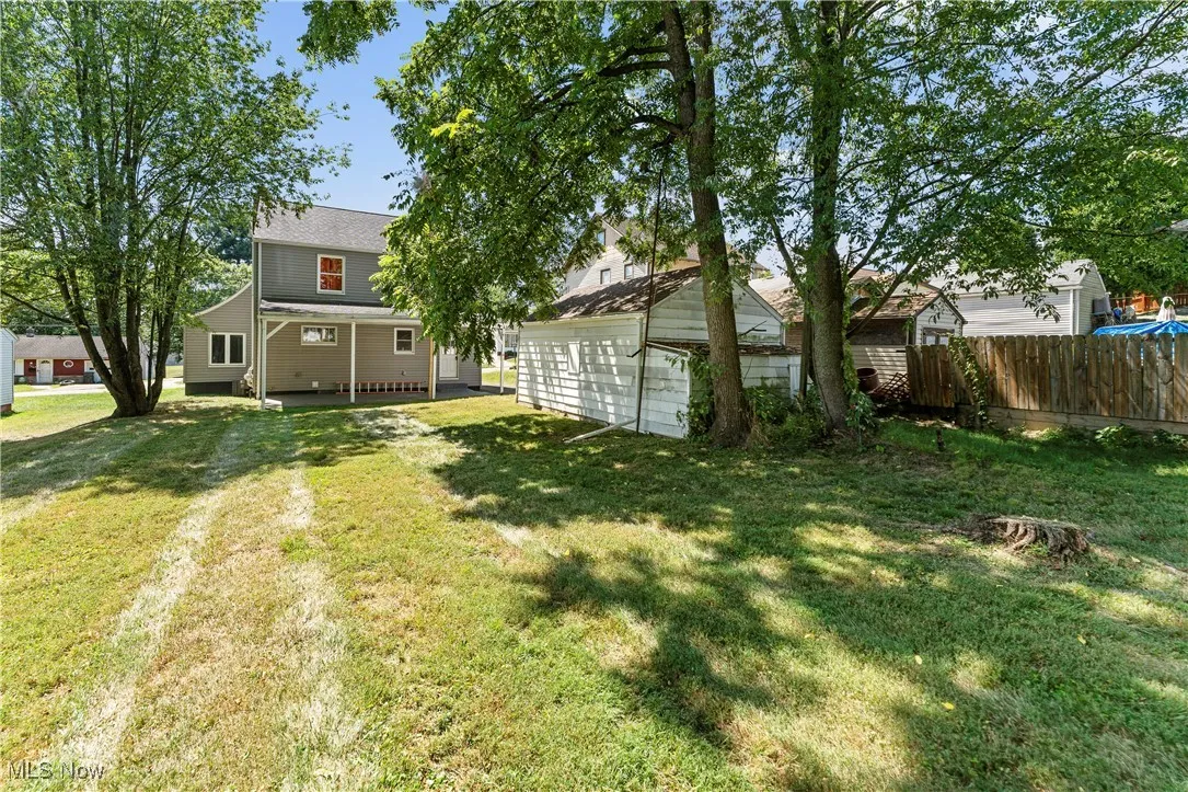 View of yard with an outbuilding