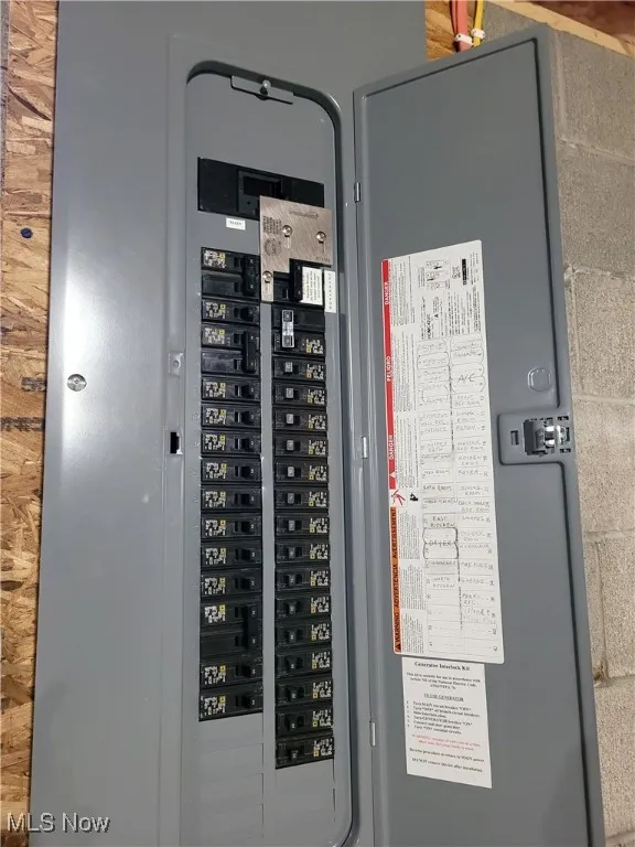 Utility room featuring electric panel
