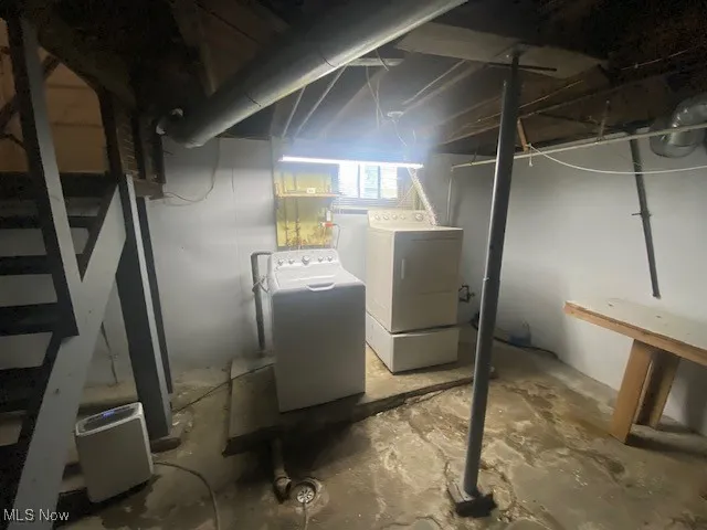 Below grade area with separate washer and dryer