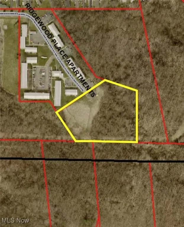 Aerial view of property's location with property parcel outlined