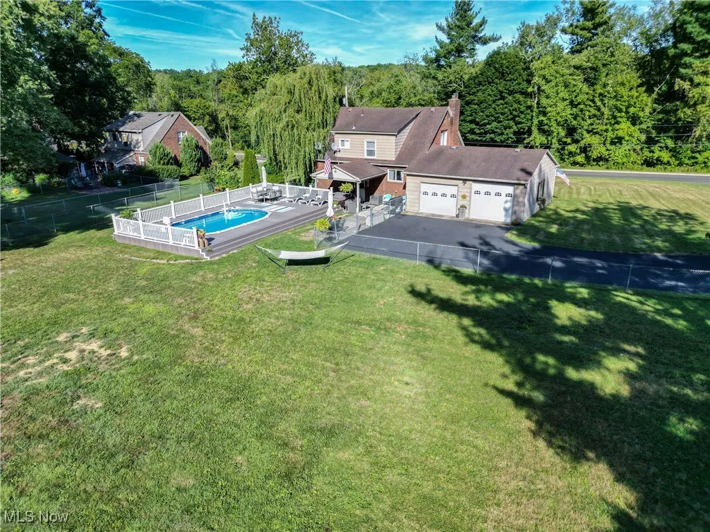 View from above of property with a pool area