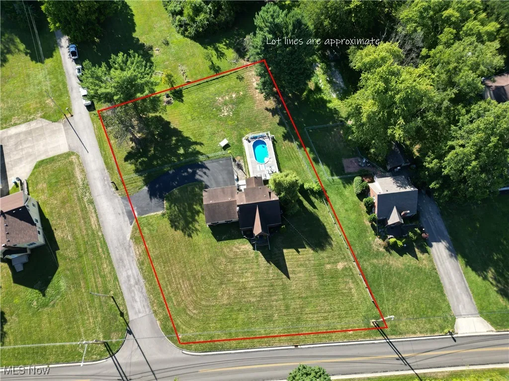 View of property location featuring a pool area and property boundaries highlighted