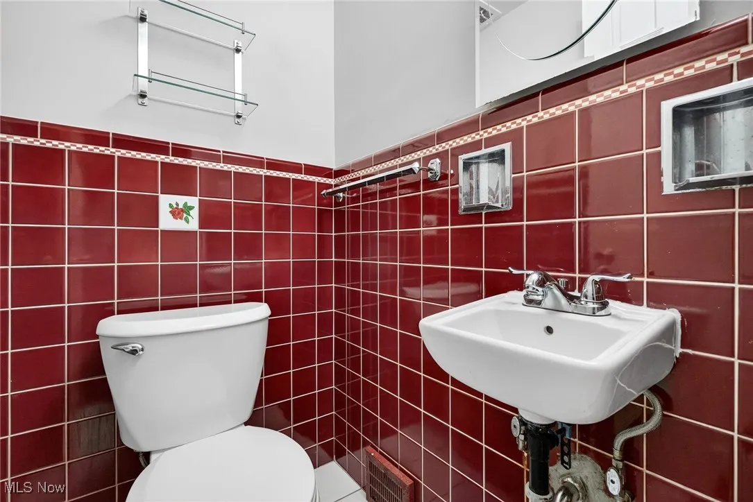 Bathroom with tile walls