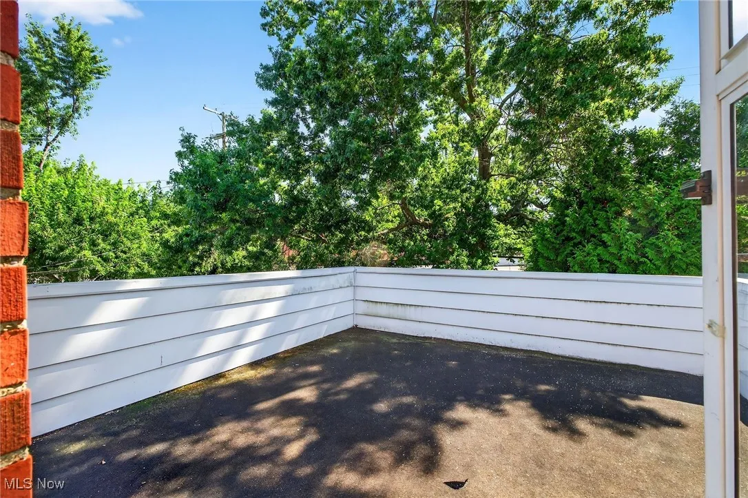 Wooden deck with a patio area
