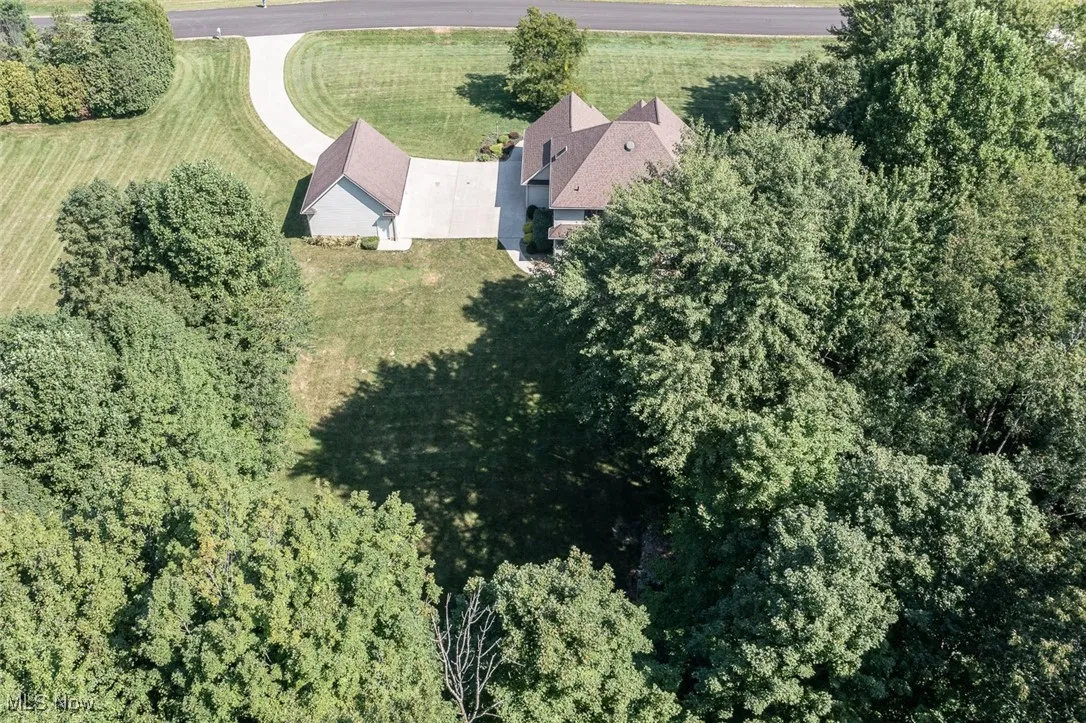 Beautiful custom home on a private 3.22 Acres conveniently located in a peaceful neighborhood, close to shops and restaurants