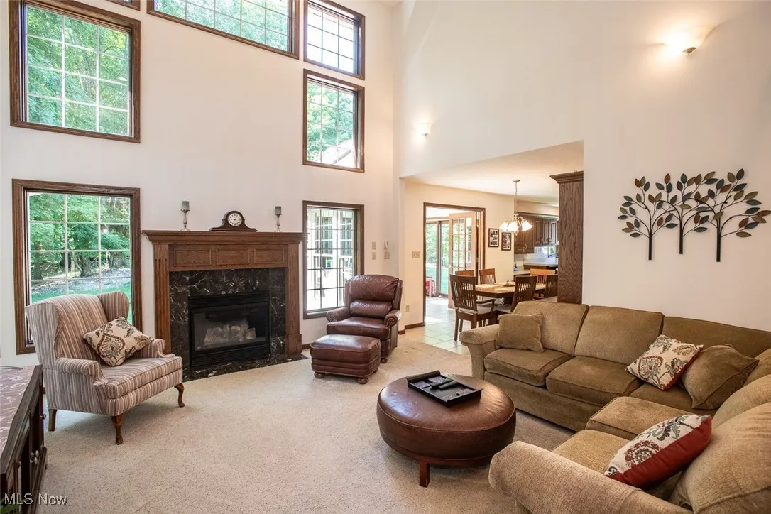 Great room, perfect for gathering around the beautiful fireplace to unwind, entertain, or host family and friends.