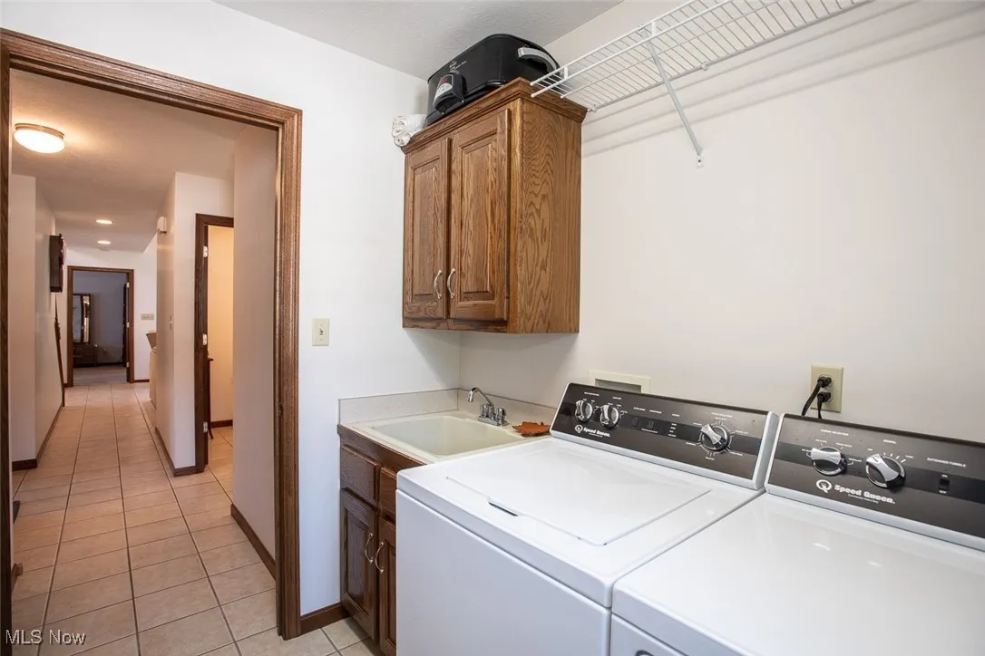 Spacious first floor laundry room.