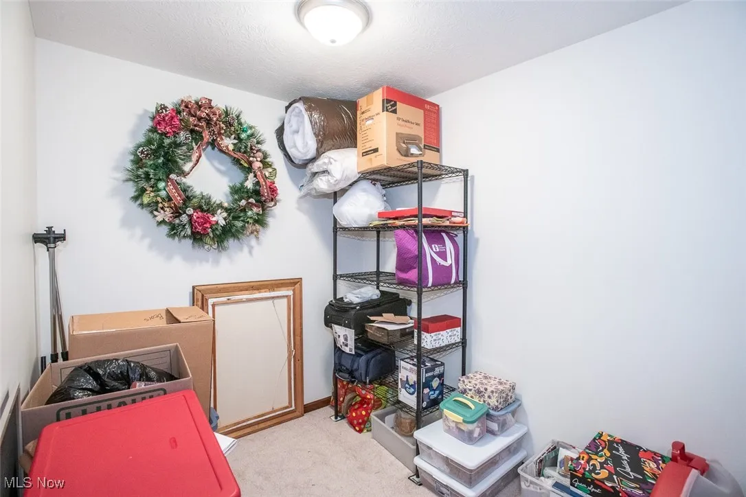 Large upstairs storage room.