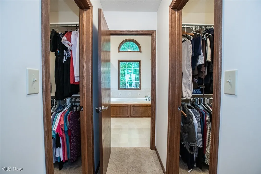 First floor owner's suite, two walk-in closets and an adjoining bathroom