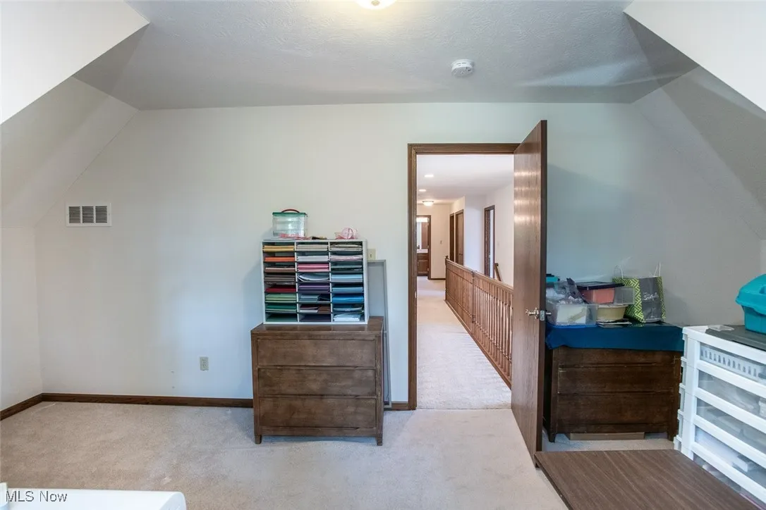 Bonus room that can easily serve as a fourth bedroom, craft room or office