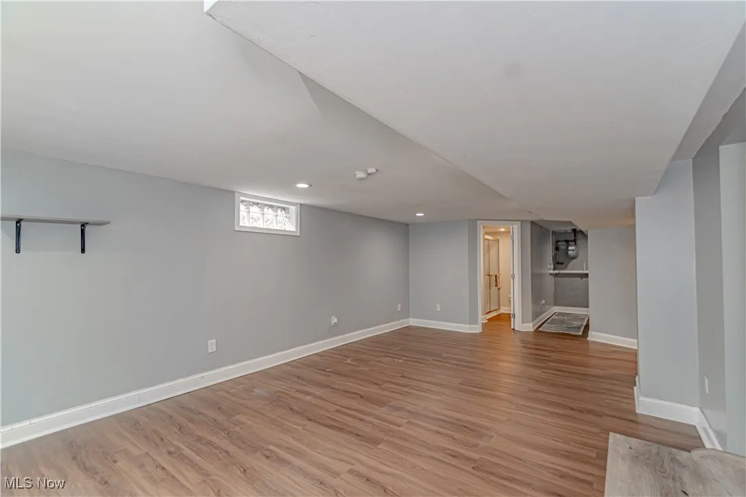 Below grade area featuring light wood finished floors